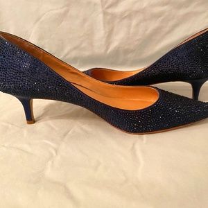 Badgley Mischka navy blue jeweled pumps.